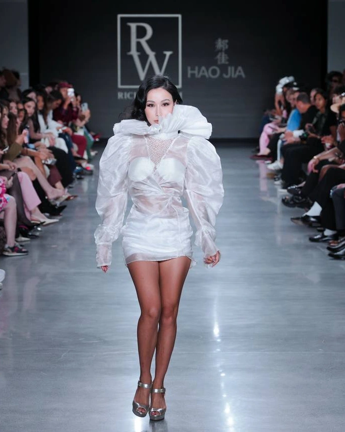 Chelsea walking in Richard Wei’s show at New York Fashion Week